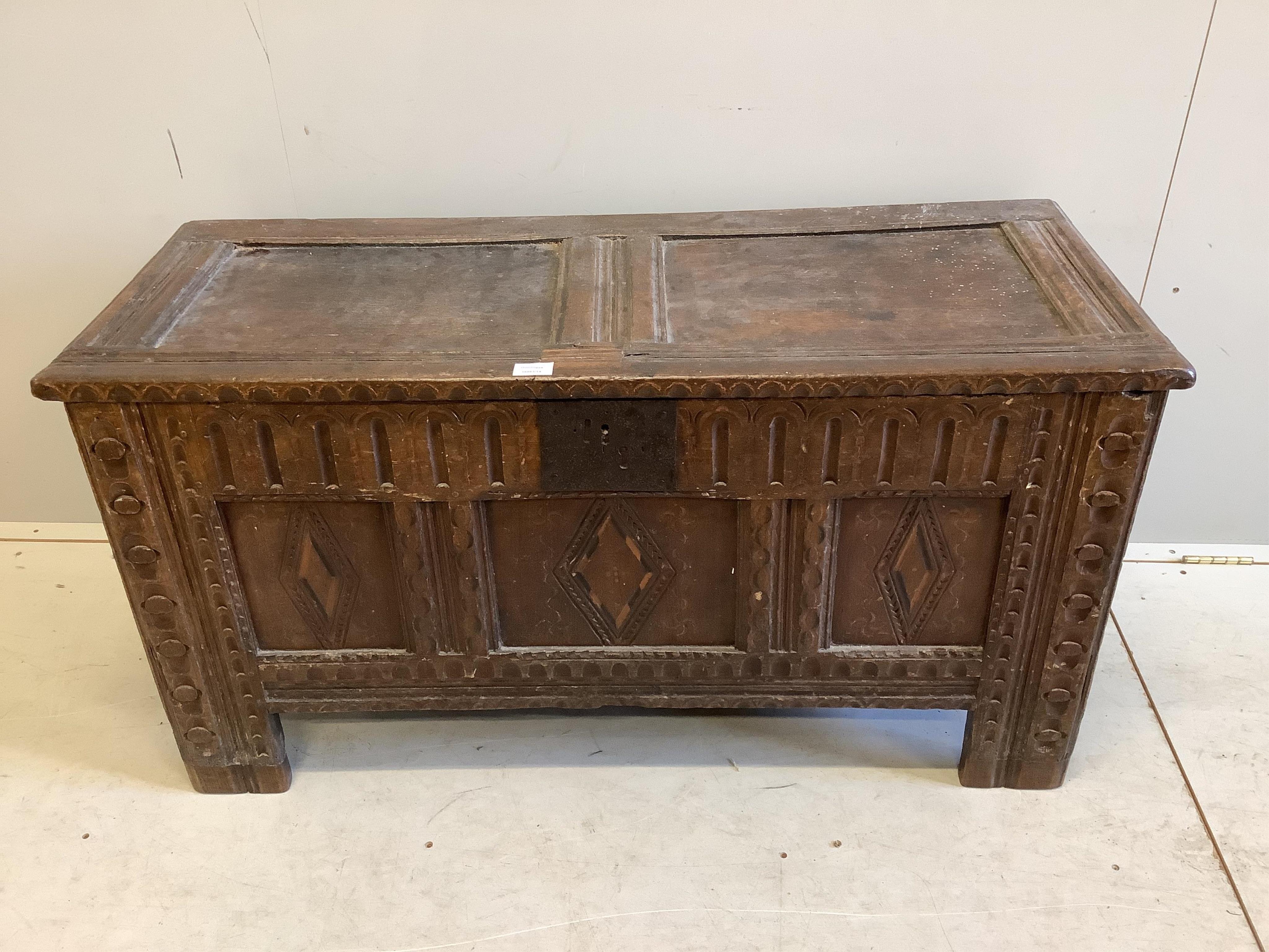 A 17th century and later carved oak coffer, width 118cm, depth 48cm, height 61cm. Condition - fair